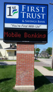 outdoor business sign with monochrome display